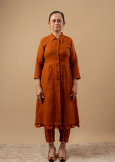 A Model Wearing Orange Organic Cotton Carolle Pants, curated by Only Ethikal